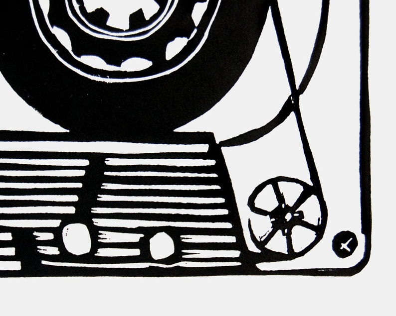 Cassette tape linocut print close up
