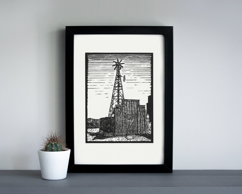 Ghost town linocut print framed