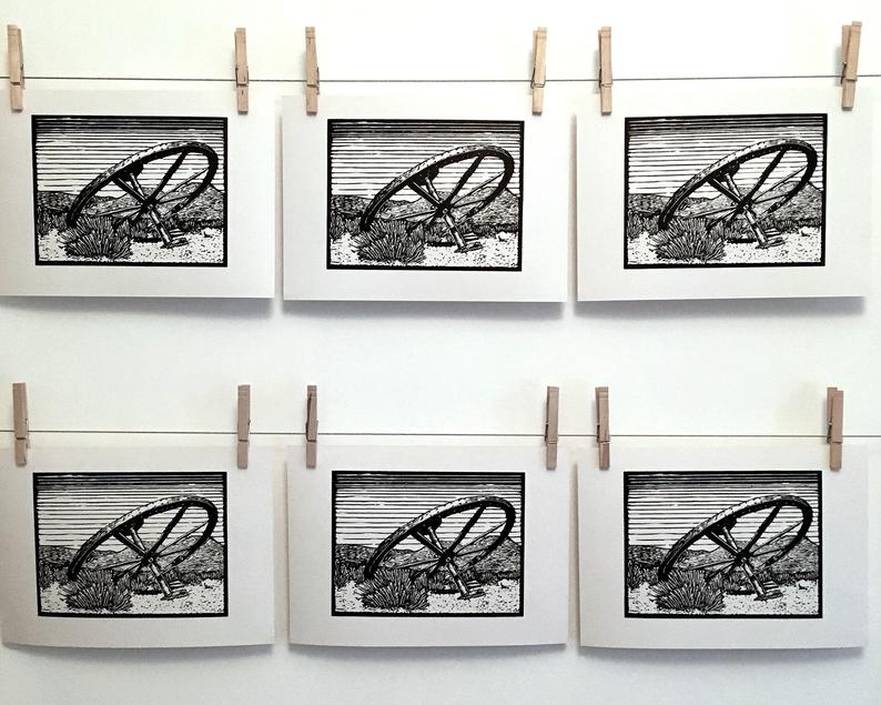 Wagon wheel linocut print hanging